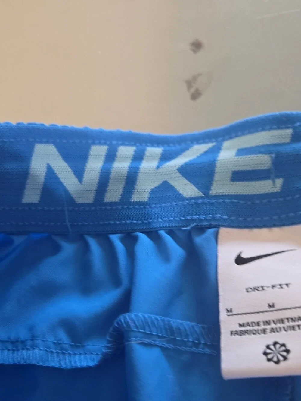 Nike Bright Blue Men's Athletic Shorts with Black Swoosh